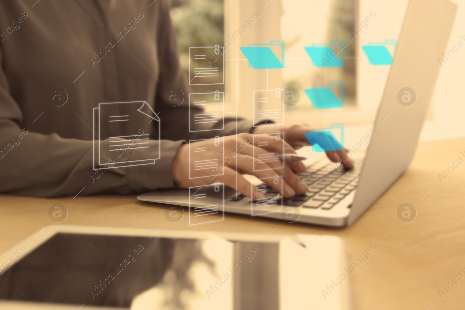 Image of Electronic document management. Woman working on laptop at table, closeup