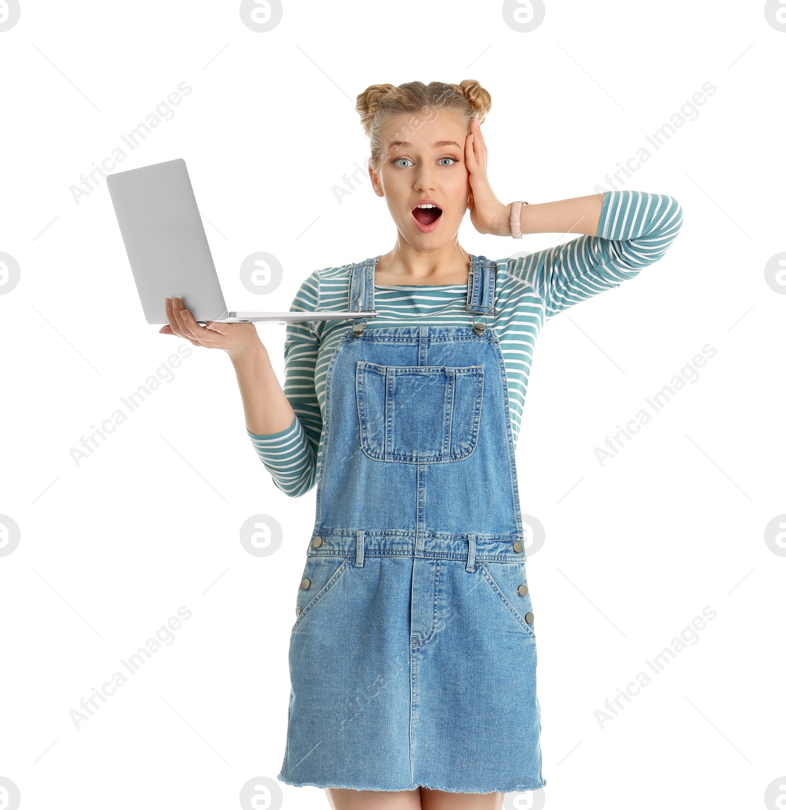 Photo of Portrait of emotional young woman with laptop isolated on white