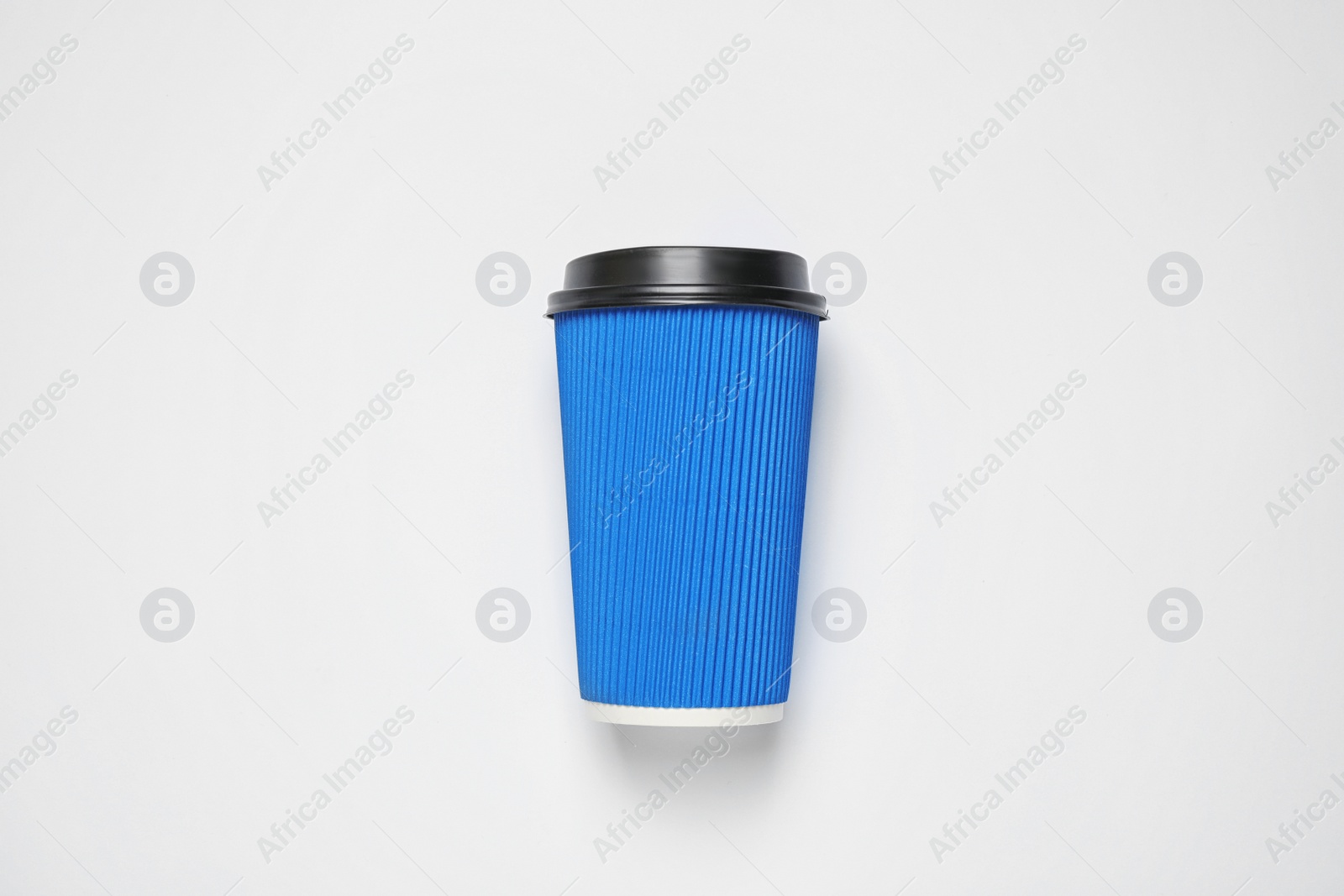 Photo of Takeaway cup on white background, top view. Color of the year 2020 (Classic blue)