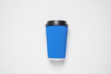 Photo of Takeaway cup on white background, top view. Color of the year 2020 (Classic blue)
