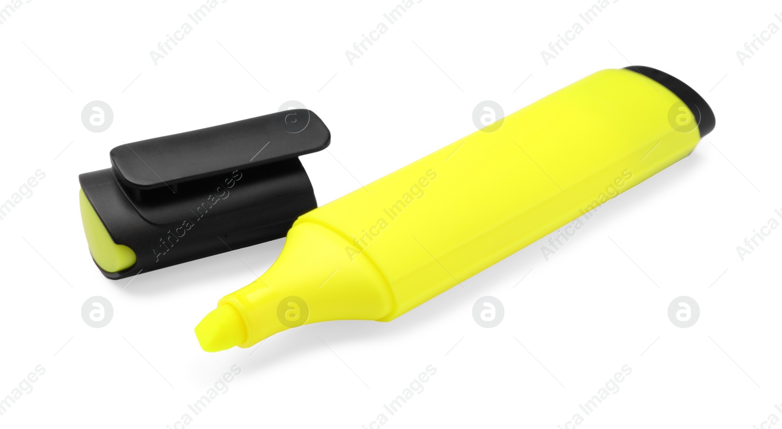 Photo of Bright yellow marker isolated on white. Office stationery