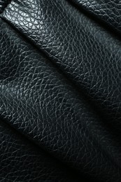 Black natural leather as background, top view