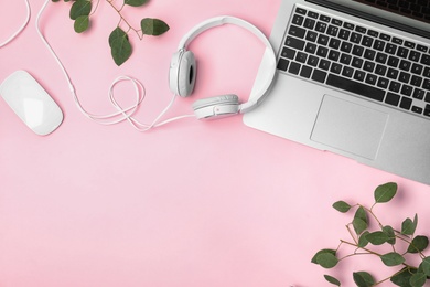 Photo of Flat lay composition with headphones, laptop and space for text on color background