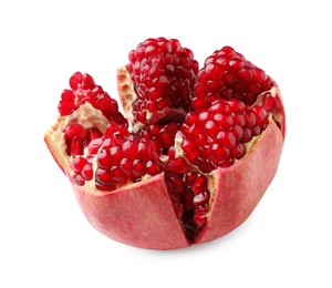 Photo of One cut fresh pomegranate isolated on white