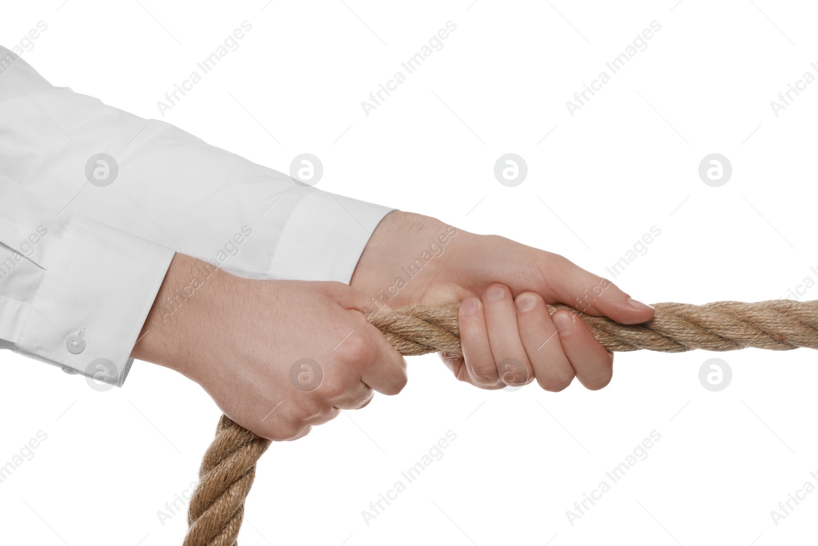 Photo of Dispute concept. Man pulling rope on white background, closeup