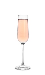 Photo of Glass of sparkling rose champagne isolated on white