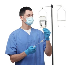 Photo of Nurse setting up IV drip on white background