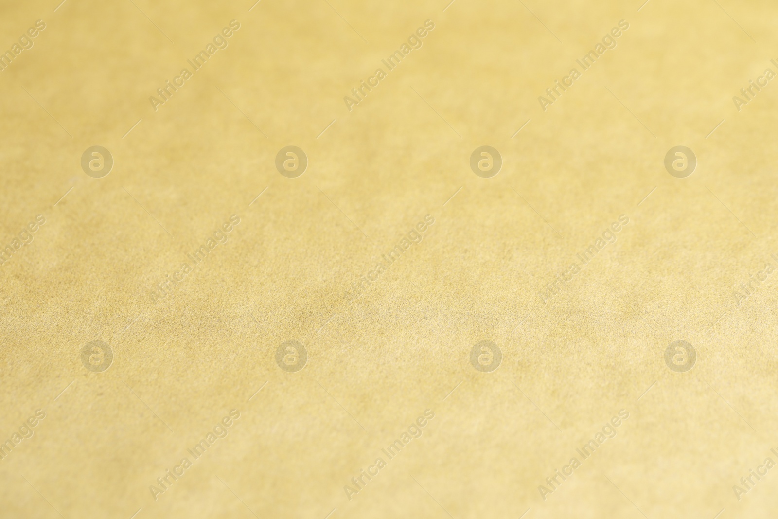 Photo of Beautiful golden surface as background, top view