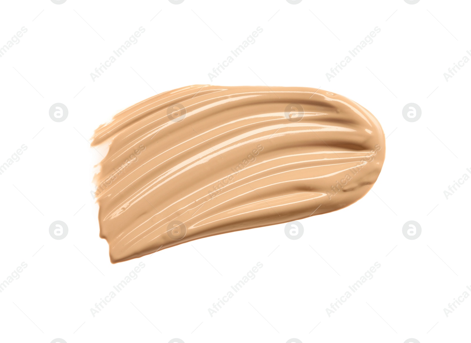 Photo of Smear of liquid skin foundation isolated on white, top view