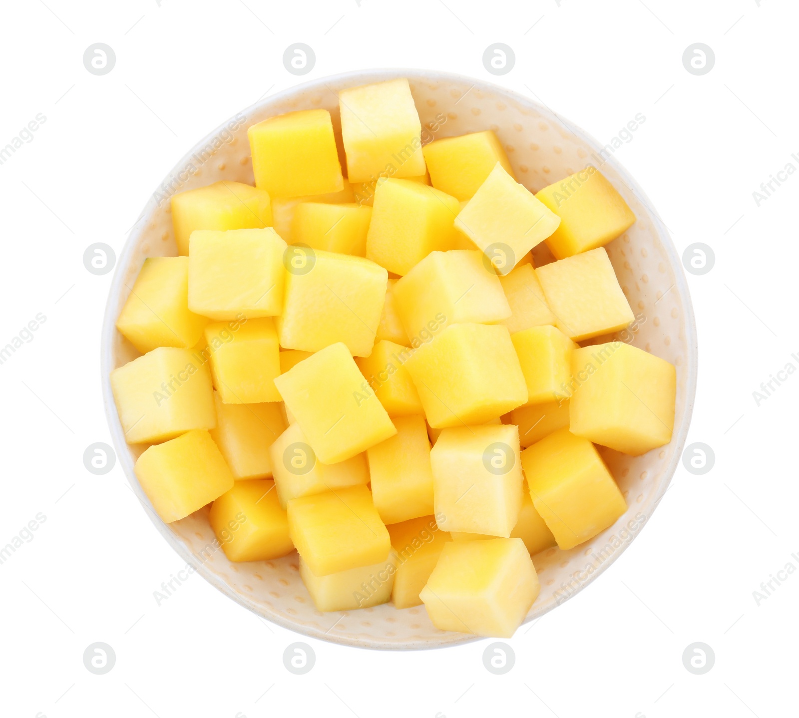 Photo of Tasty mango cubes in ceramic bowl isolated on white, top view