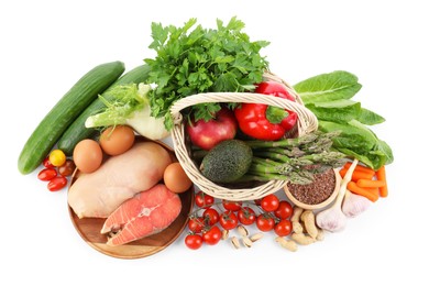 Photo of Healthy food. Basket with different fresh products isolated on white, top view