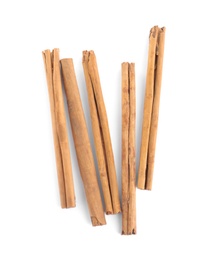 Photo of Aromatic cinnamon sticks on white background, top view