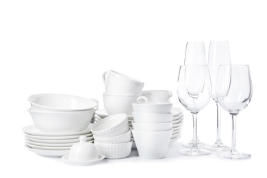 Photo of Set of clean tableware on white background. Washing dishes