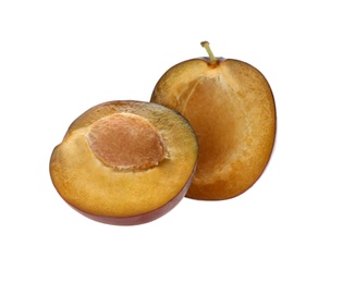Cut fresh ripe plum isolated on white
