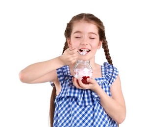 Photo of Cute girl eating tasty yogurt on white background