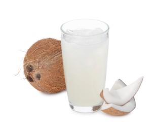 Glass of coconut water, ice cubes and nuts isolated on white