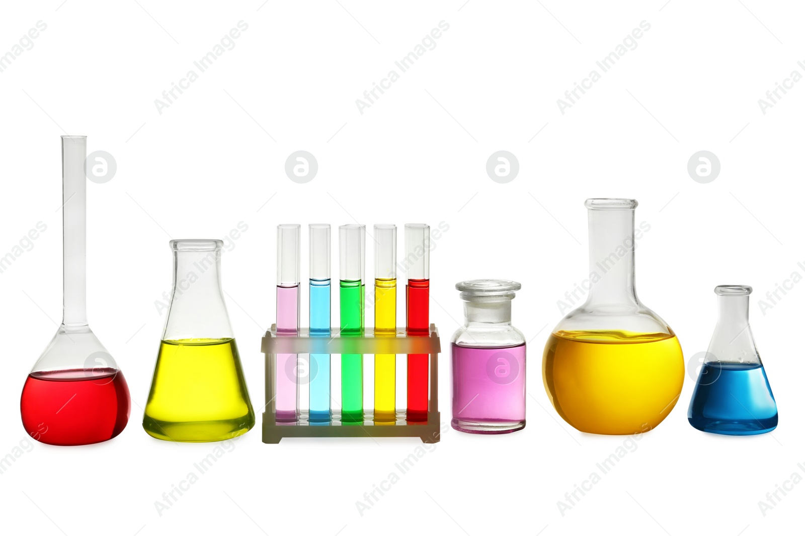 Photo of Laboratory glassware with colorful liquids on white background