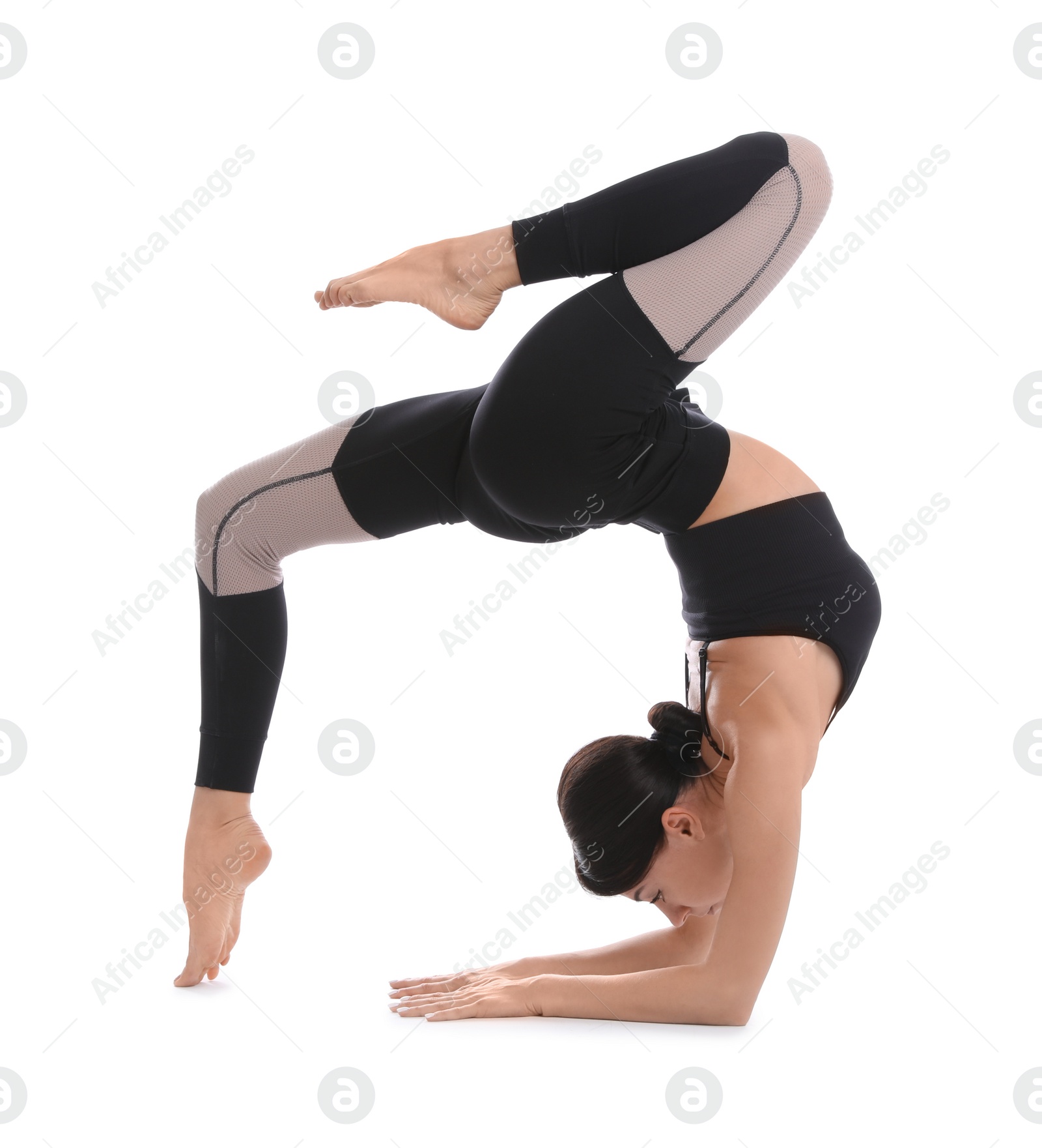 Photo of Professional young acrobat exercising on white background