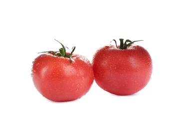 Photo of Fresh ripe organic tomatoes with water drops isolated on white