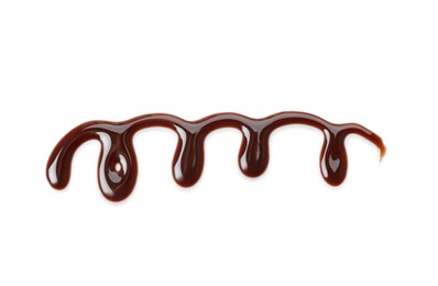 Photo of Pattern made of melted chocolate on white background
