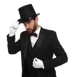 Magician in top hat on white background