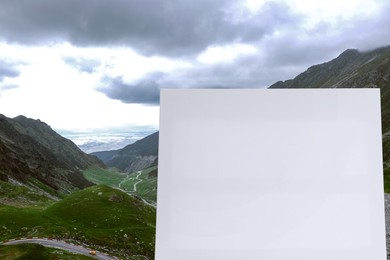 Blank canvas and picturesque view of mountains. Space for text