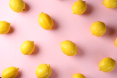 Photo of Flat lay composition with fresh ripe lemons on color background