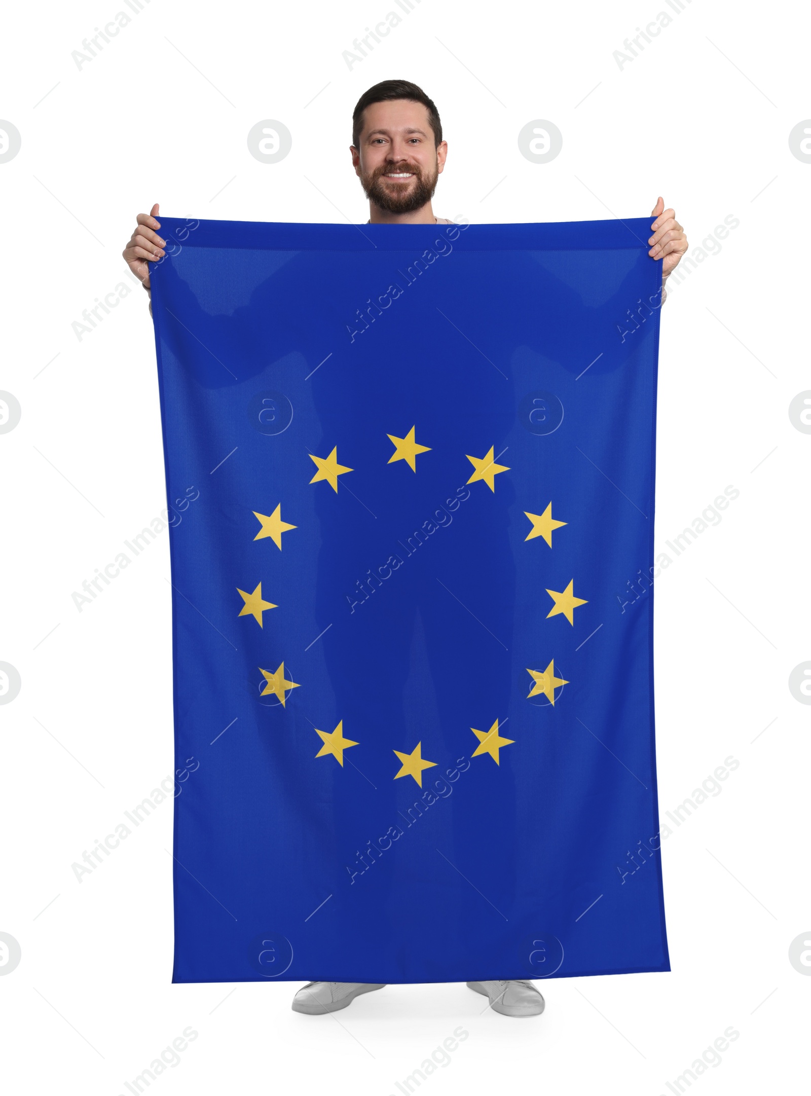 Photo of Man holding European Union flag on white background