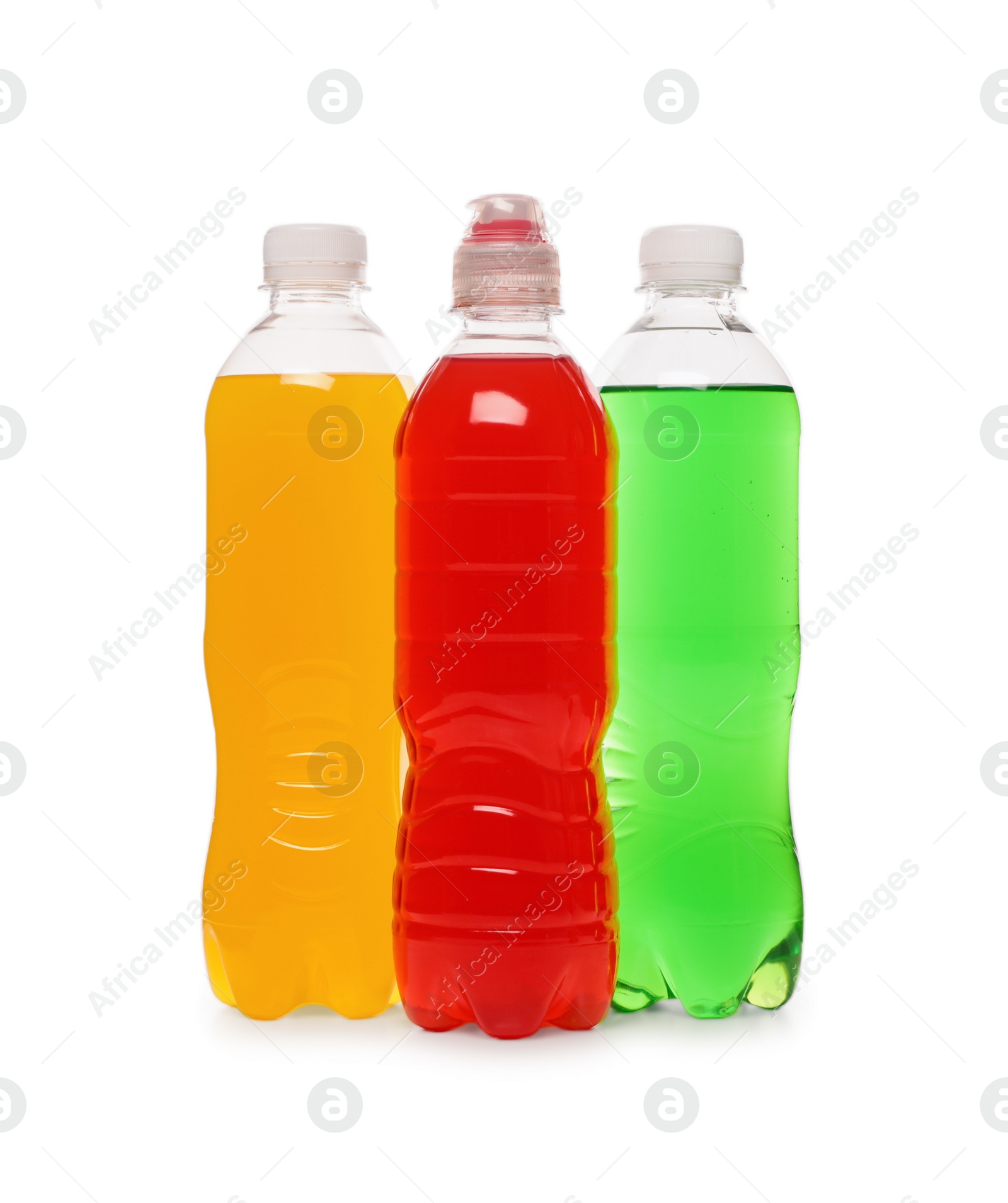 Photo of Bottles of soft drinks on white background