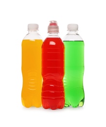 Bottles of soft drinks on white background