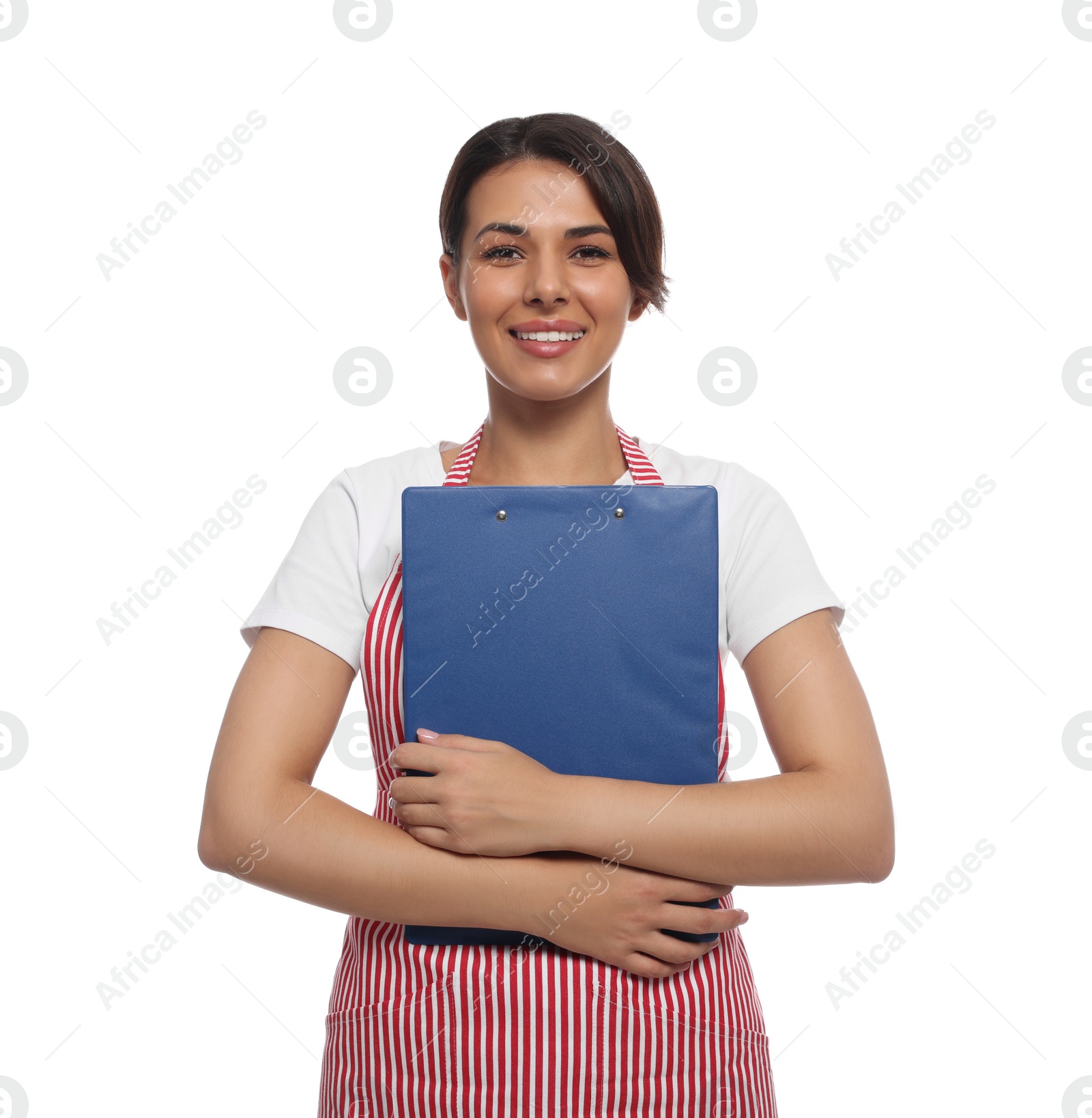 Photo of Young woman in red striped apron with clipboard on white background