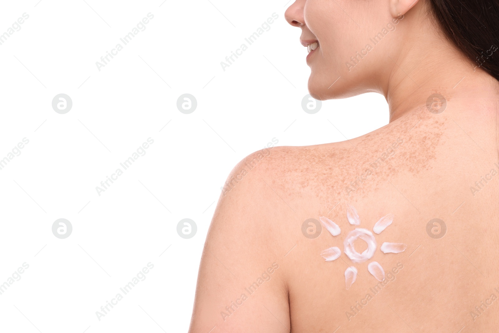 Photo of Beautiful young woman with sun protection cream on her back against white background, closeup