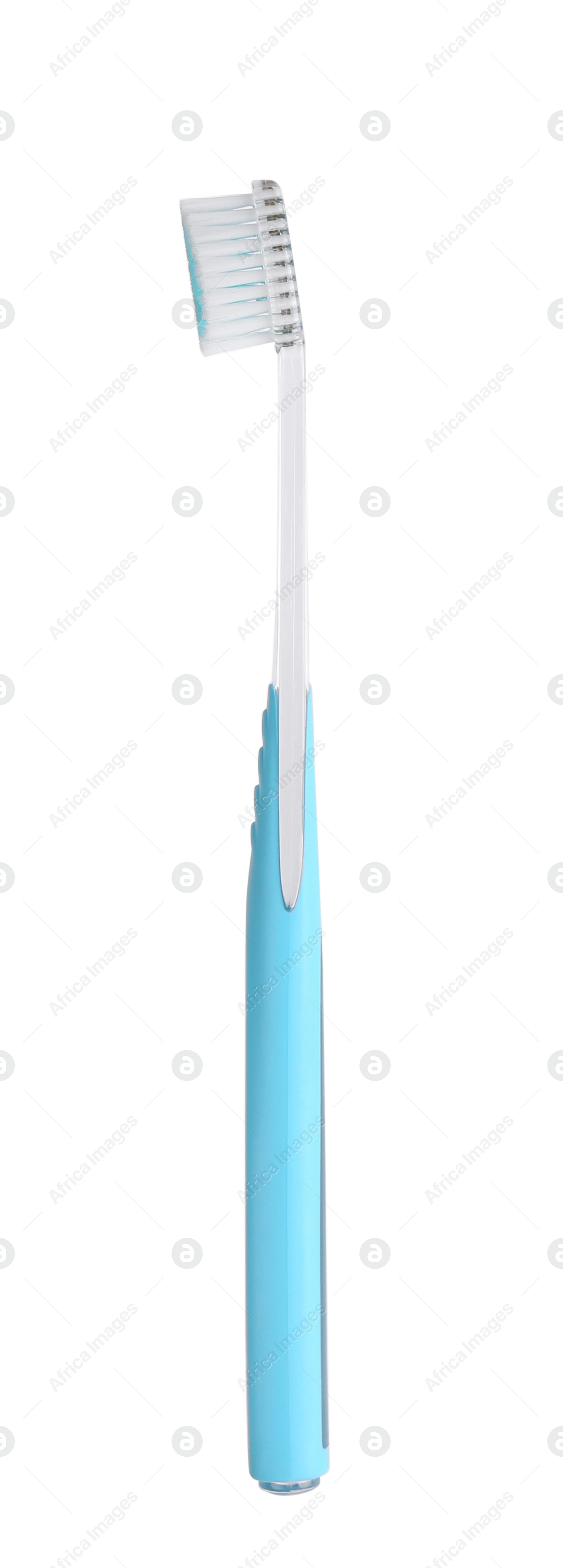 Photo of Light blue plastic toothbrush isolated on white