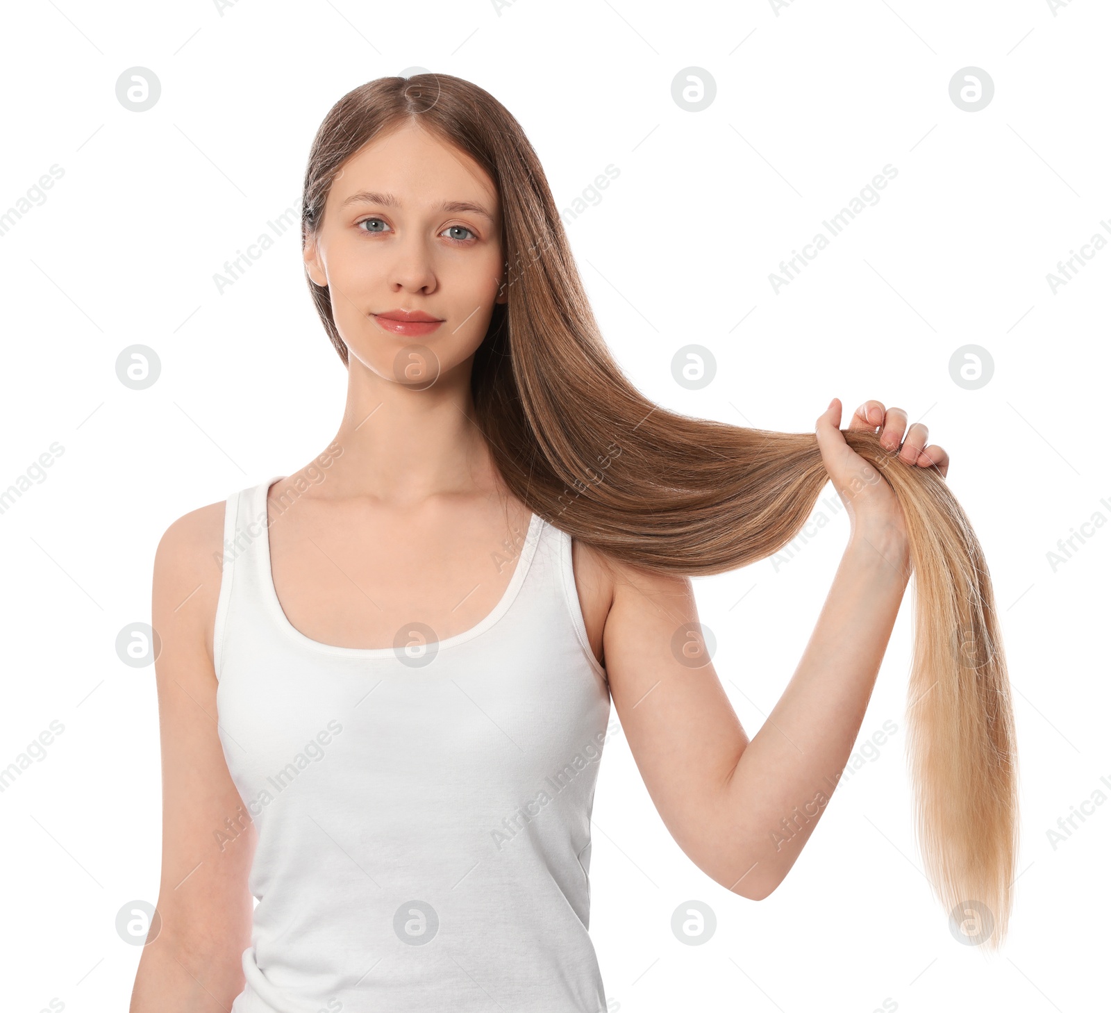 Photo of Teenage girl with strong healthy hair on white background