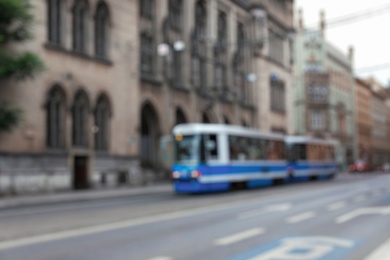 Blurred view of city street with beautiful building