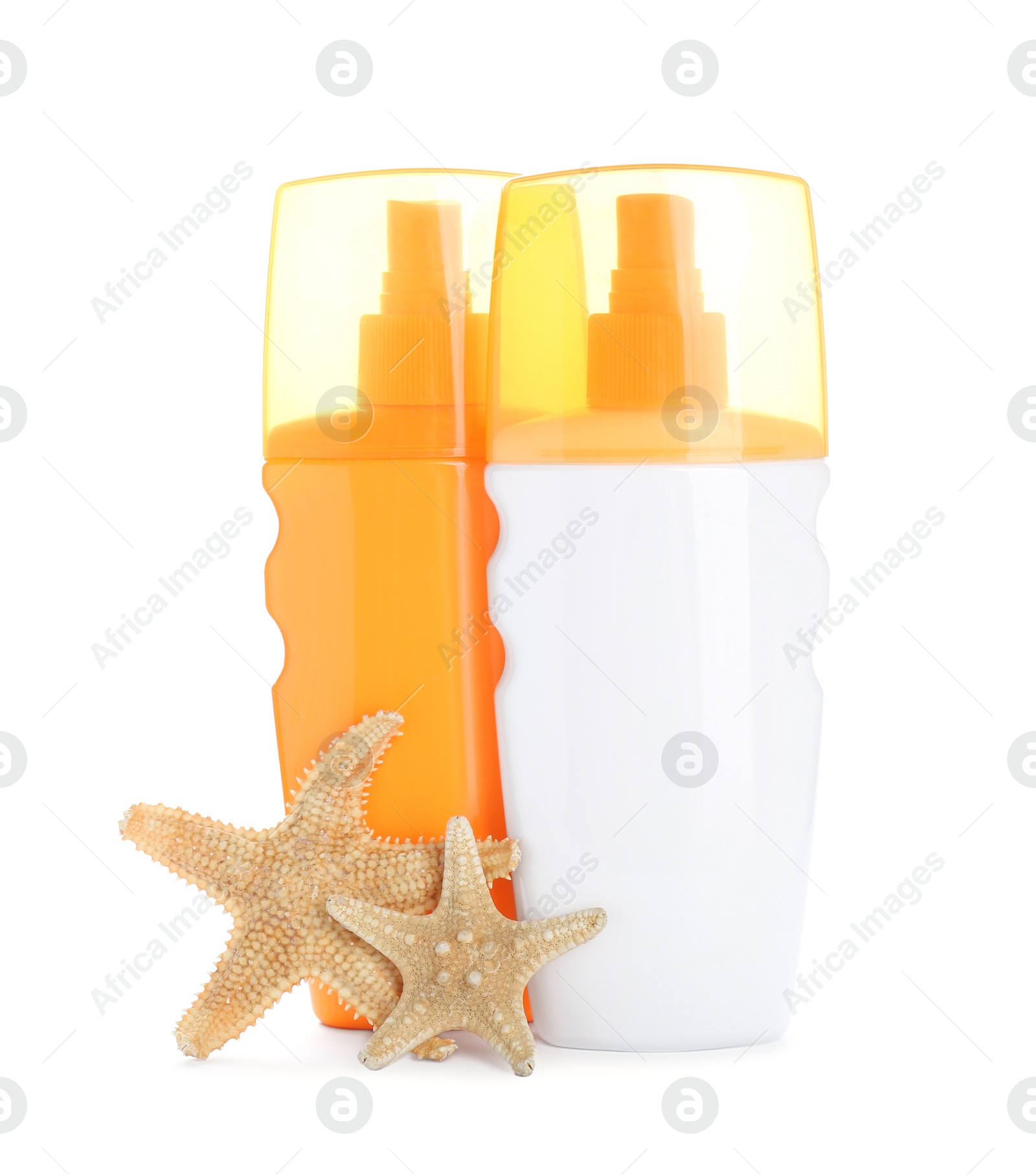 Photo of Different suntan products and starfishes on white background