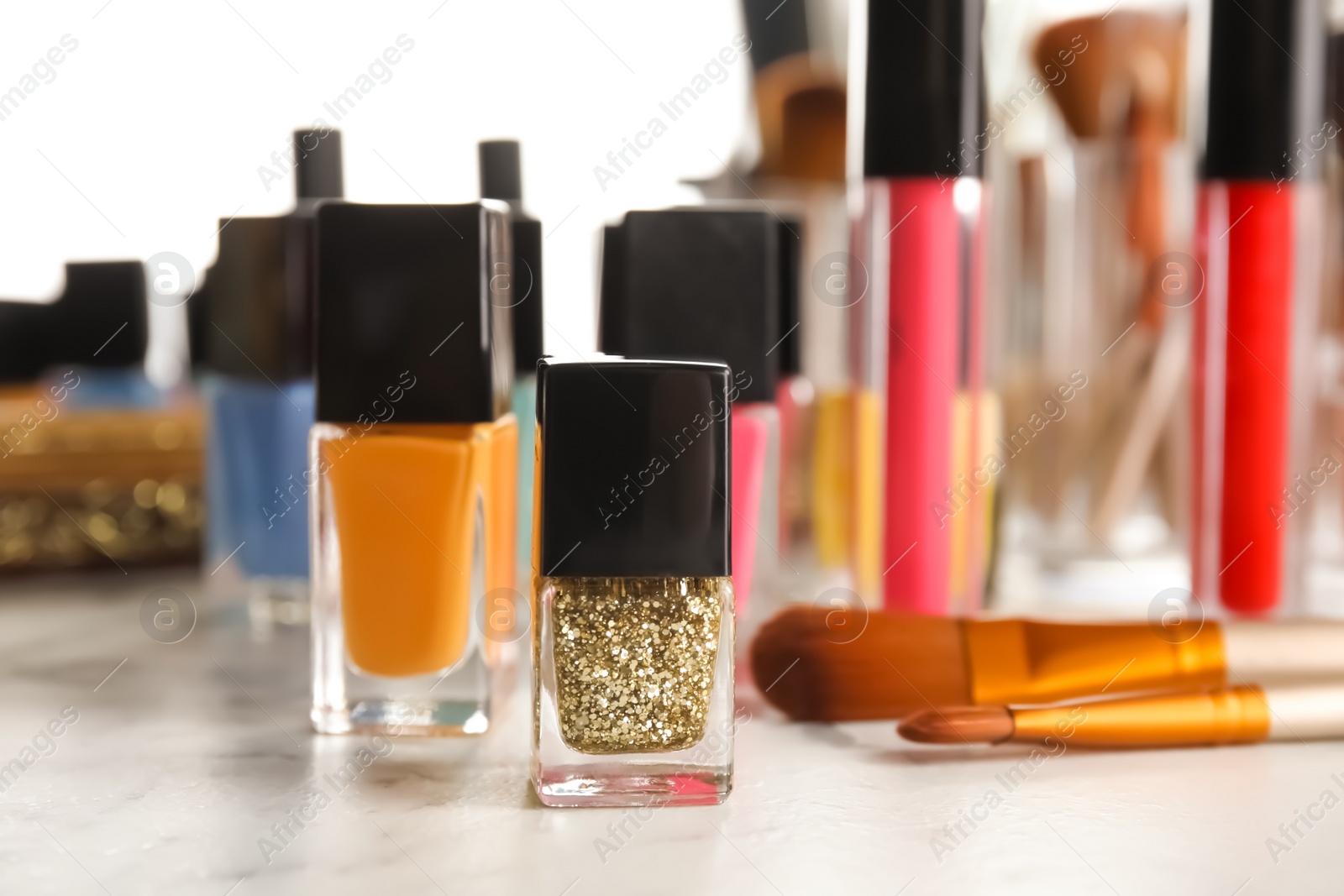 Photo of Bottles of nail polish on dressing table