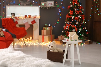 Santa's room interior with toys and Christmas tree