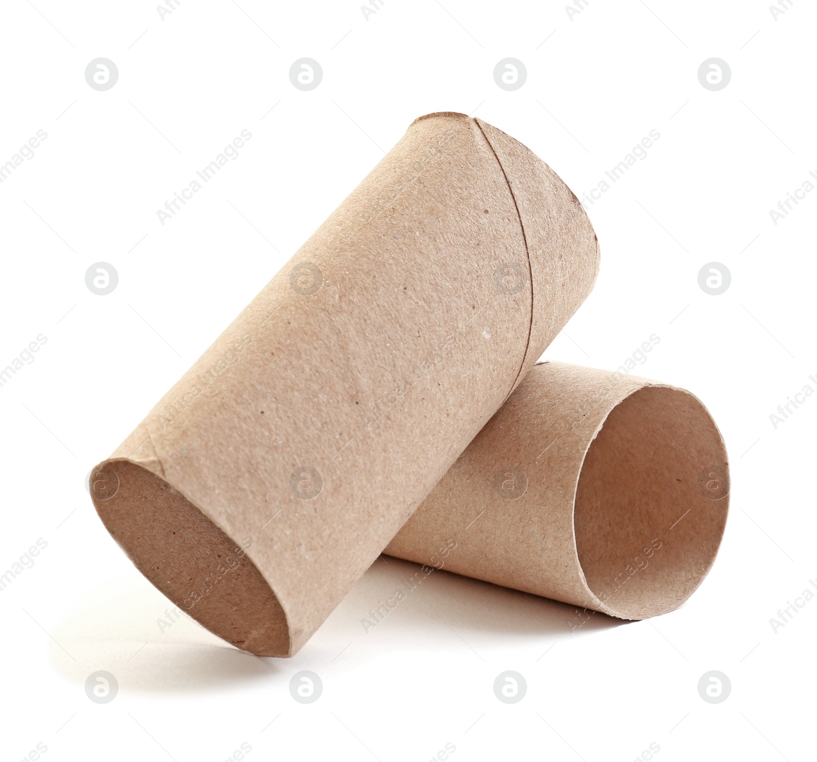 Photo of Empty paper toilet rolls on white background