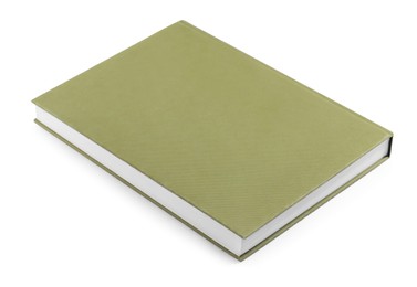 One closed green hardcover book isolated on white