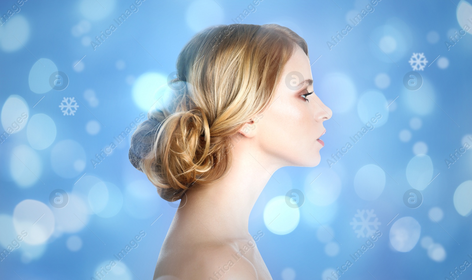 Image of Young woman with perfect smooth skin on blue background, bokeh effect 