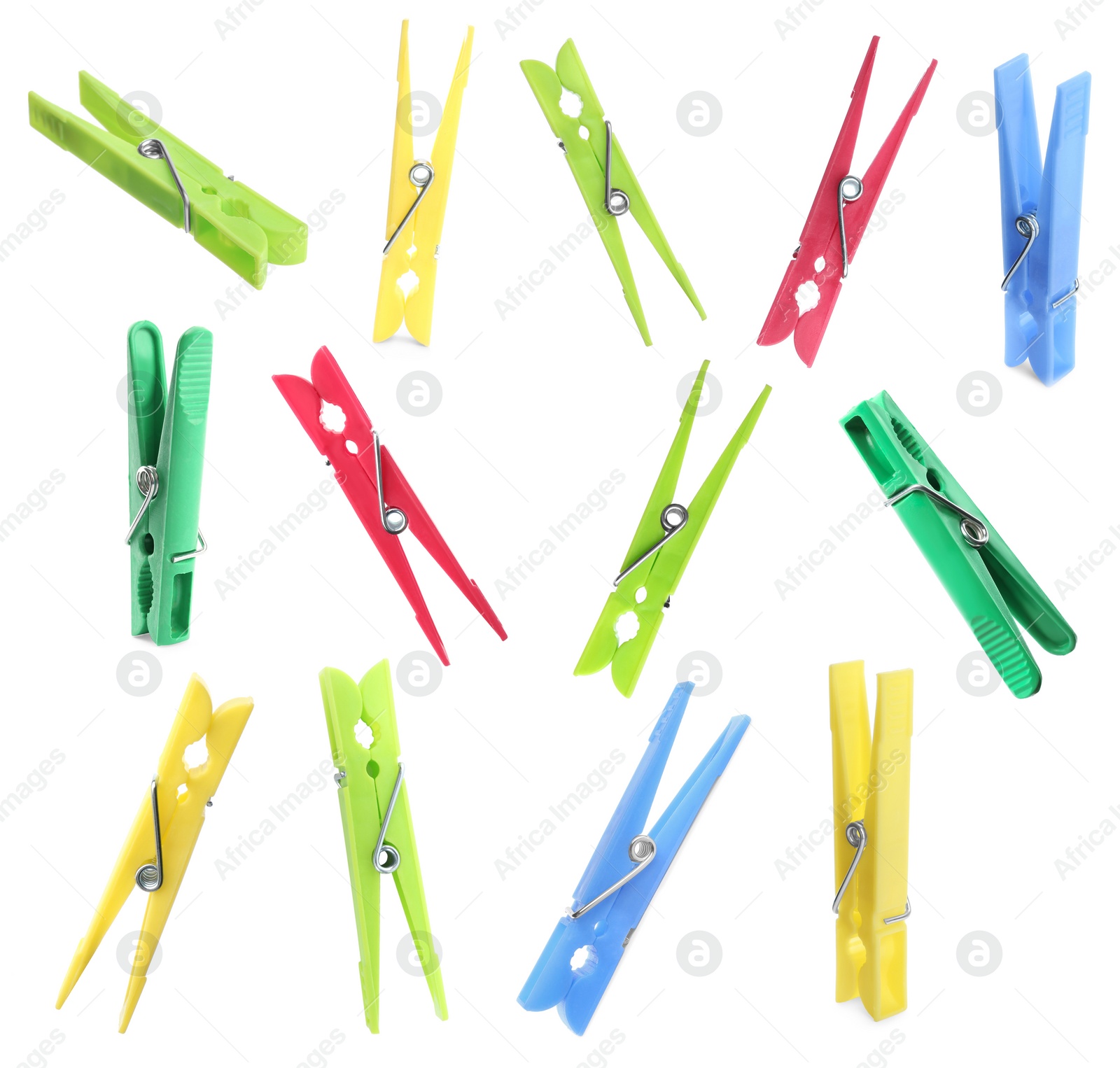 Image of Set with bright plastic clothespins on white background 