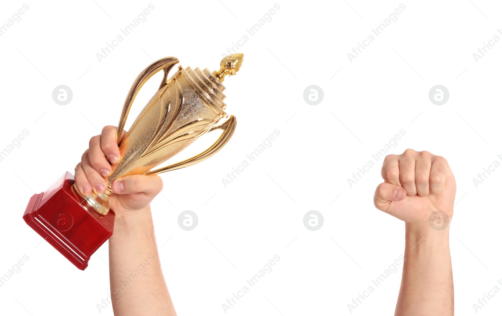 Photo of Young man holding gold trophy cup on white background, closeup