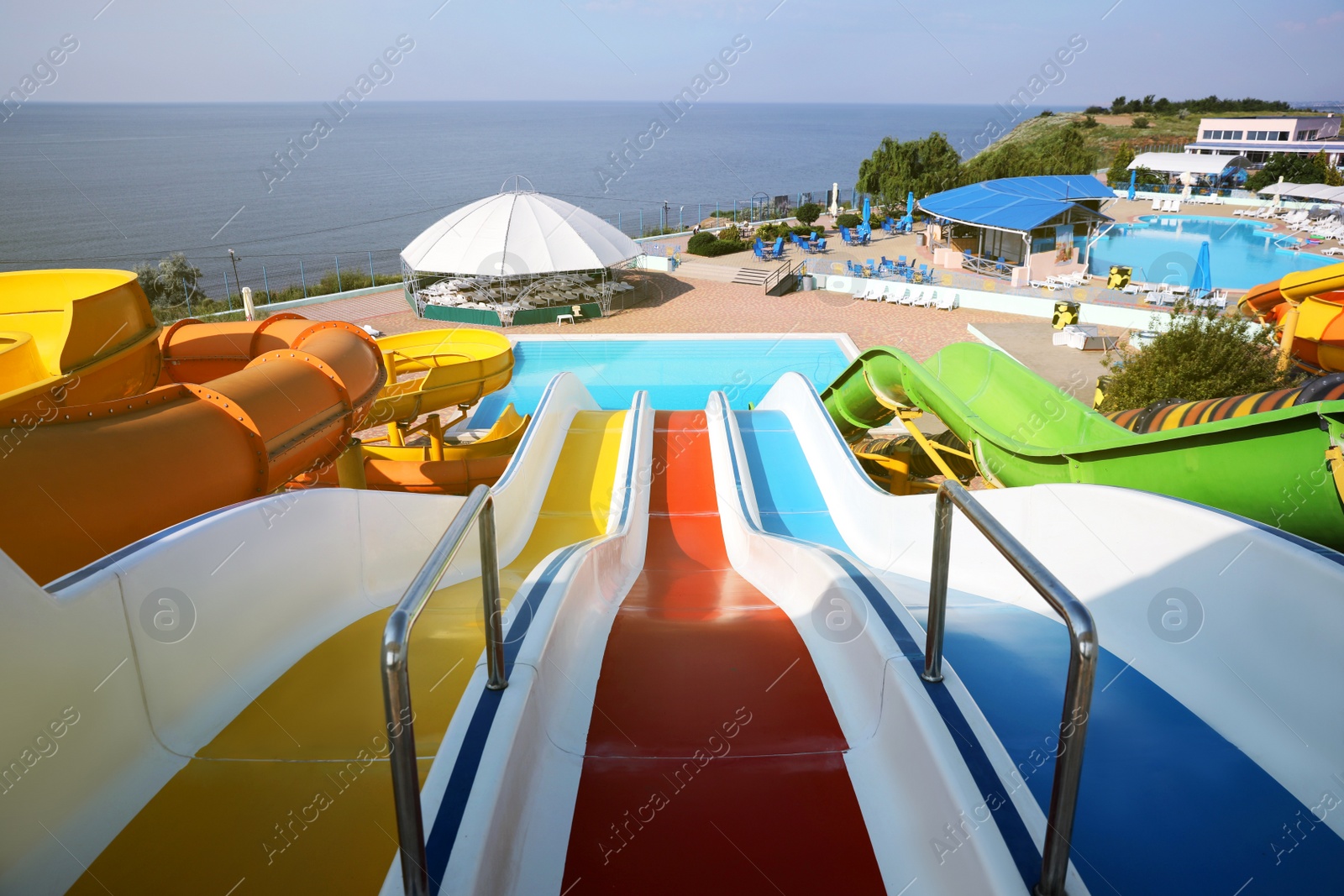 Photo of Colorful slides in water park on sunny day