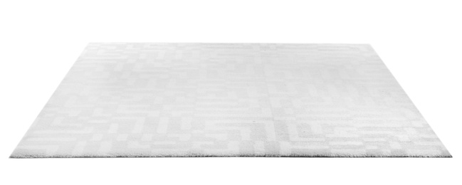 Photo of Soft carpet on white background. Interior element