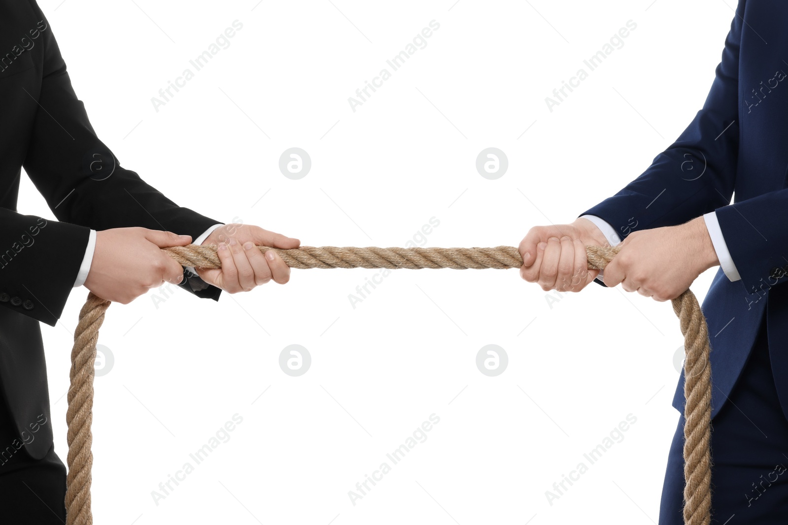 Photo of Dispute concept. Men pulling rope on white background, closeup