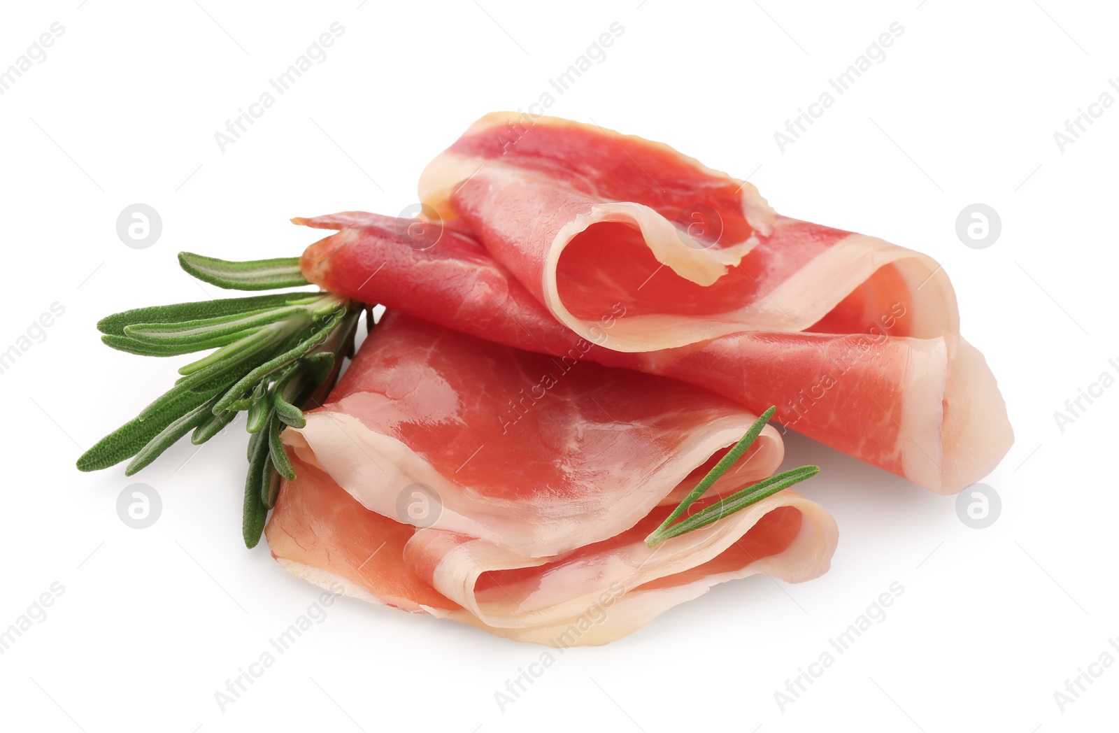 Photo of Slices of delicious jamon with rosemary on white background