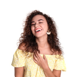 Portrait of beautiful laughing African-American woman on white background