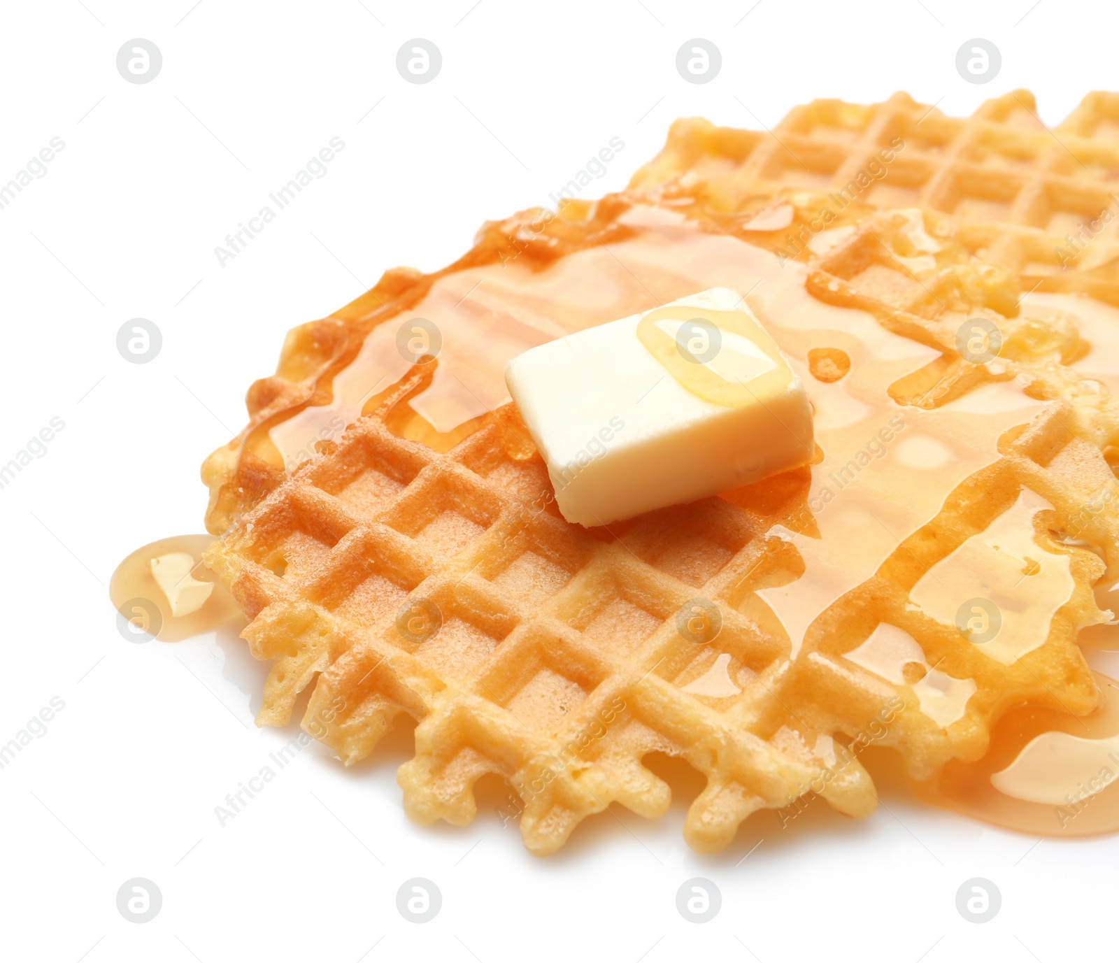 Photo of Delicious waffles with butter and honey on white background, closeup