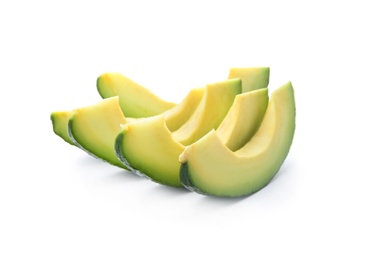 Photo of Slices of ripe avocado on white background